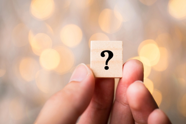 question mark on a wooden chip depicting Commercial Propane Supplier FAQs